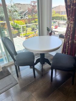 Table and two chairs