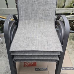 A Set Of 4 StyleWell Patio Furniture Chairs