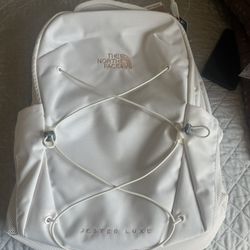 White And Pink North Face Backpack 