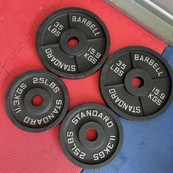 New pair of 25 and 35lb iron olympic plates  $120