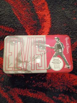 Elvis Presley Russell Stover 10 with hinged lid and chocolates.