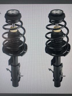 Front strut shock assembly