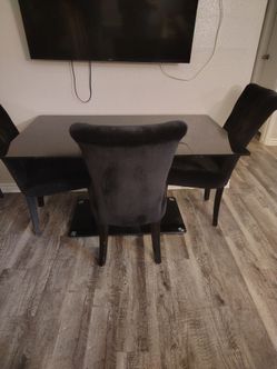 Juego De Mesa de comedor de vidrio templado color negro pesado y tres sillas negras