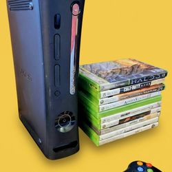 Microsoft Xbox 360 with 2 controllers 10 games power supply
