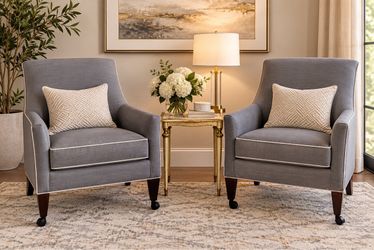 Pair of Gray Accent Chairs on Wheels