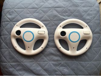 Wii Steering Wheels ( 5 dollars each )