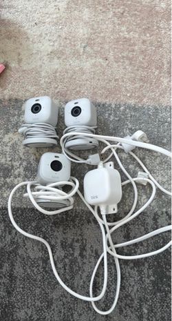 3 Blink Mini Indoor Security Cameras and weather resistant power adapter