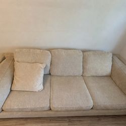 Grey sofa with pull out bed