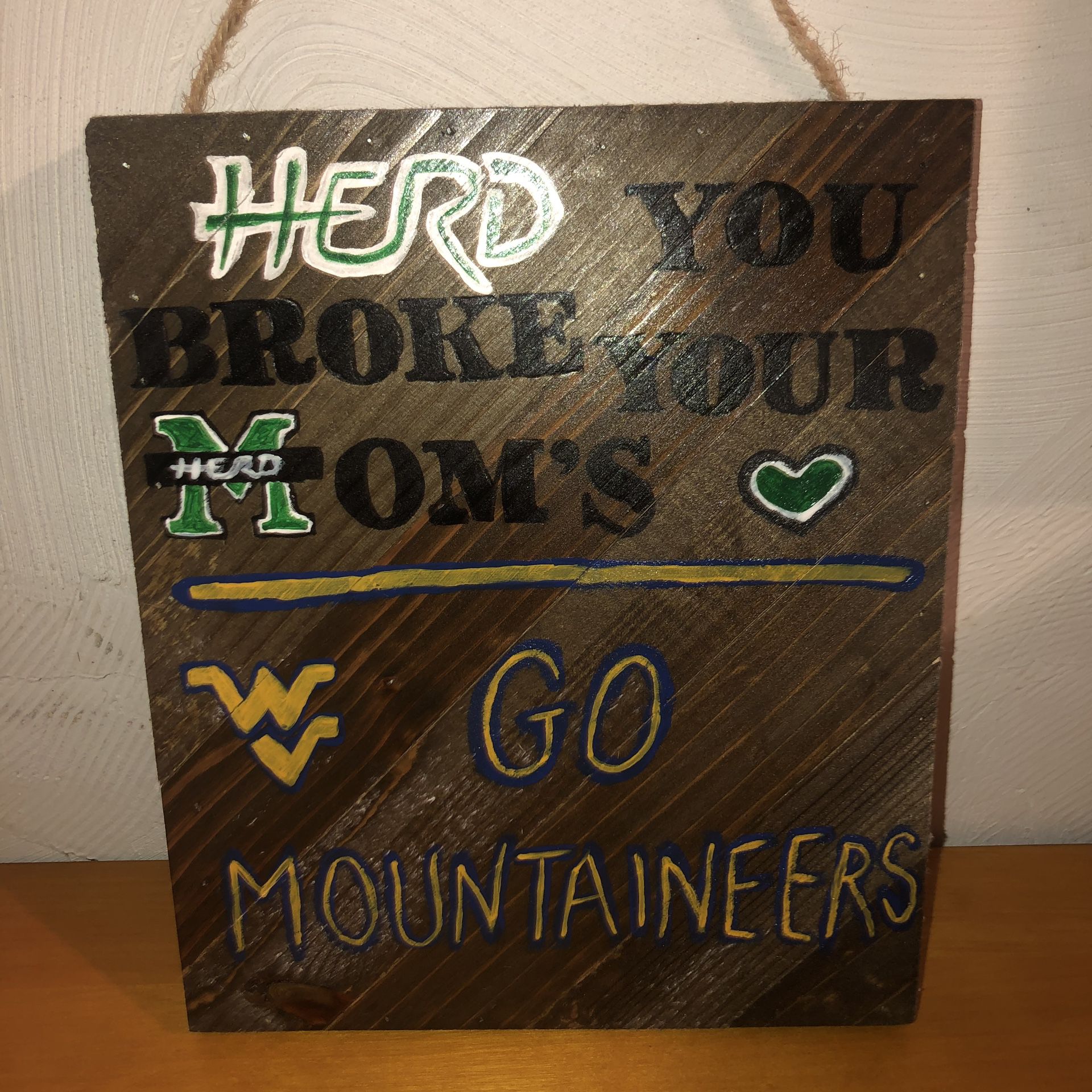 NEW WITH TAGS Jillibean large wooden Marshall Herd & WV Mountaineers hand painted sign/picture/decoration with a rope strap to hang it on the wall