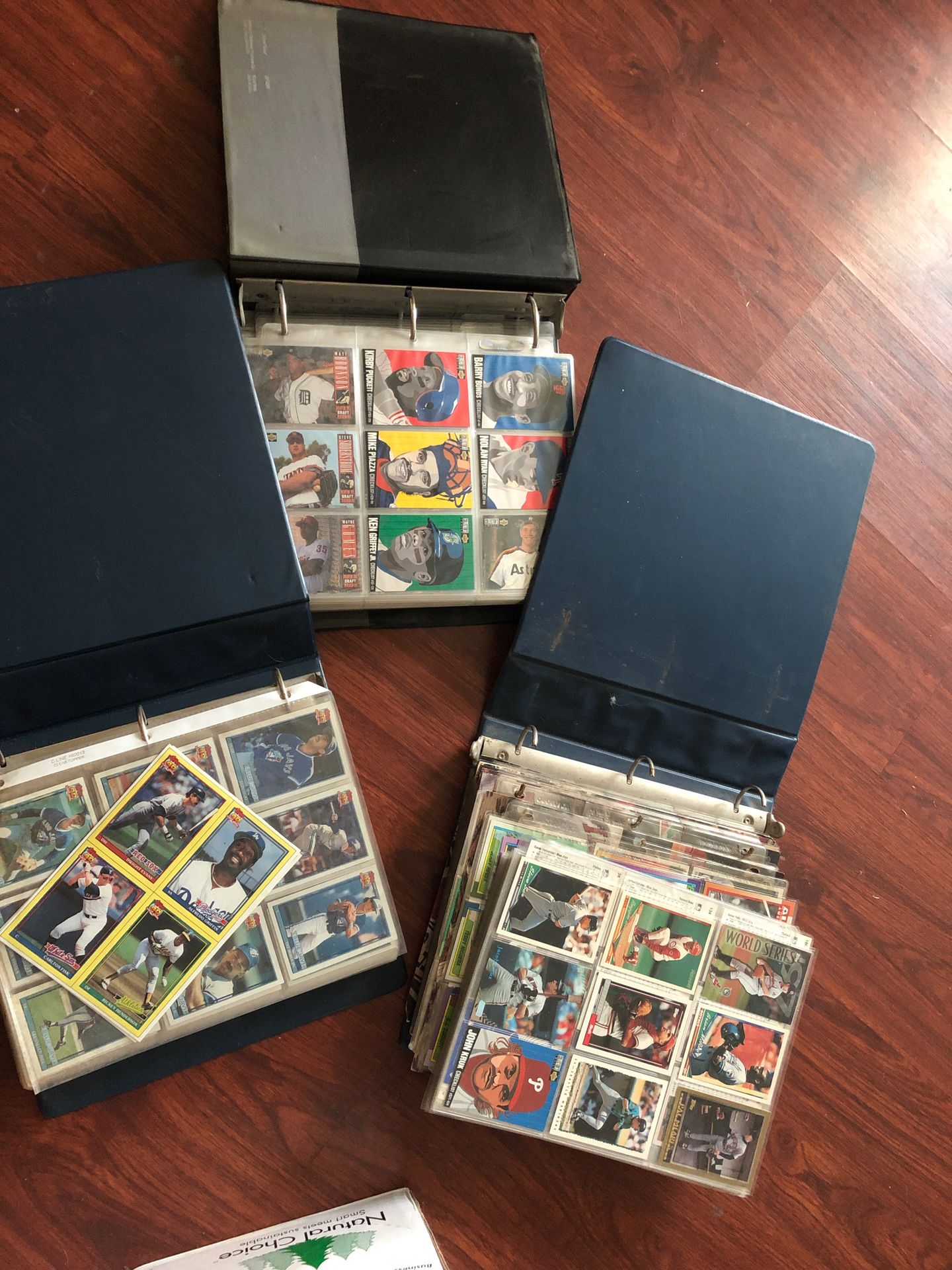 Baseball cards in 3 large albums