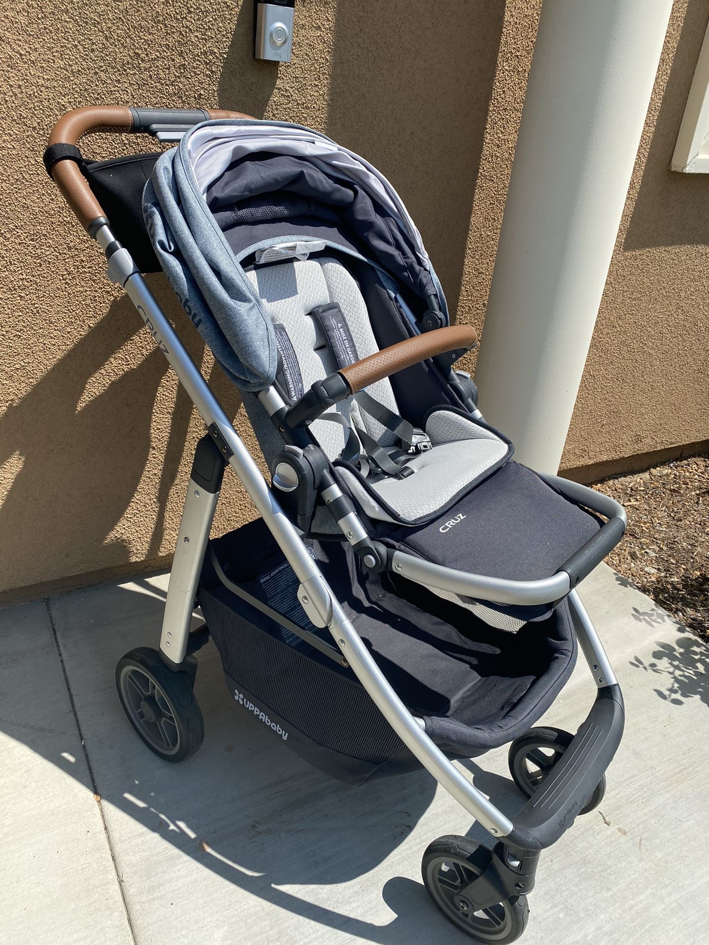 Uppababy Cruz stroller and Mesa infant car seat with base