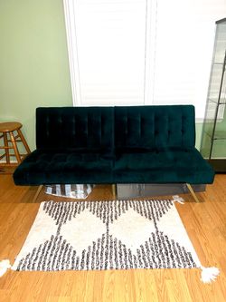 Green velvet futon couch