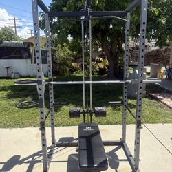 Power Rack With Flat Bench Olympic Bar 2/35 Pounds Olympic Weights And 55 Pounds Of Standard 1” Weights For The Pulley