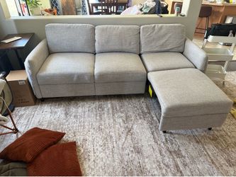 Couch with pullout ottoman