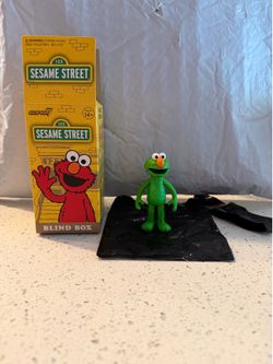 Super7 Sesame Street Elmo ReAction Figure Mystery Box - Green Elmo