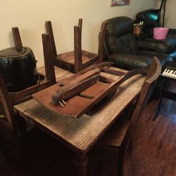 Antique wood table that seats 4. All parts are present and accounted for. I inherited this table from my great great grandmother.