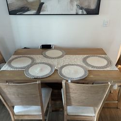 table of 4 and a bench