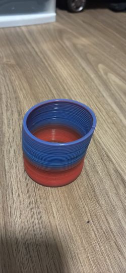 Blue and Red Plastic Slinky Toy