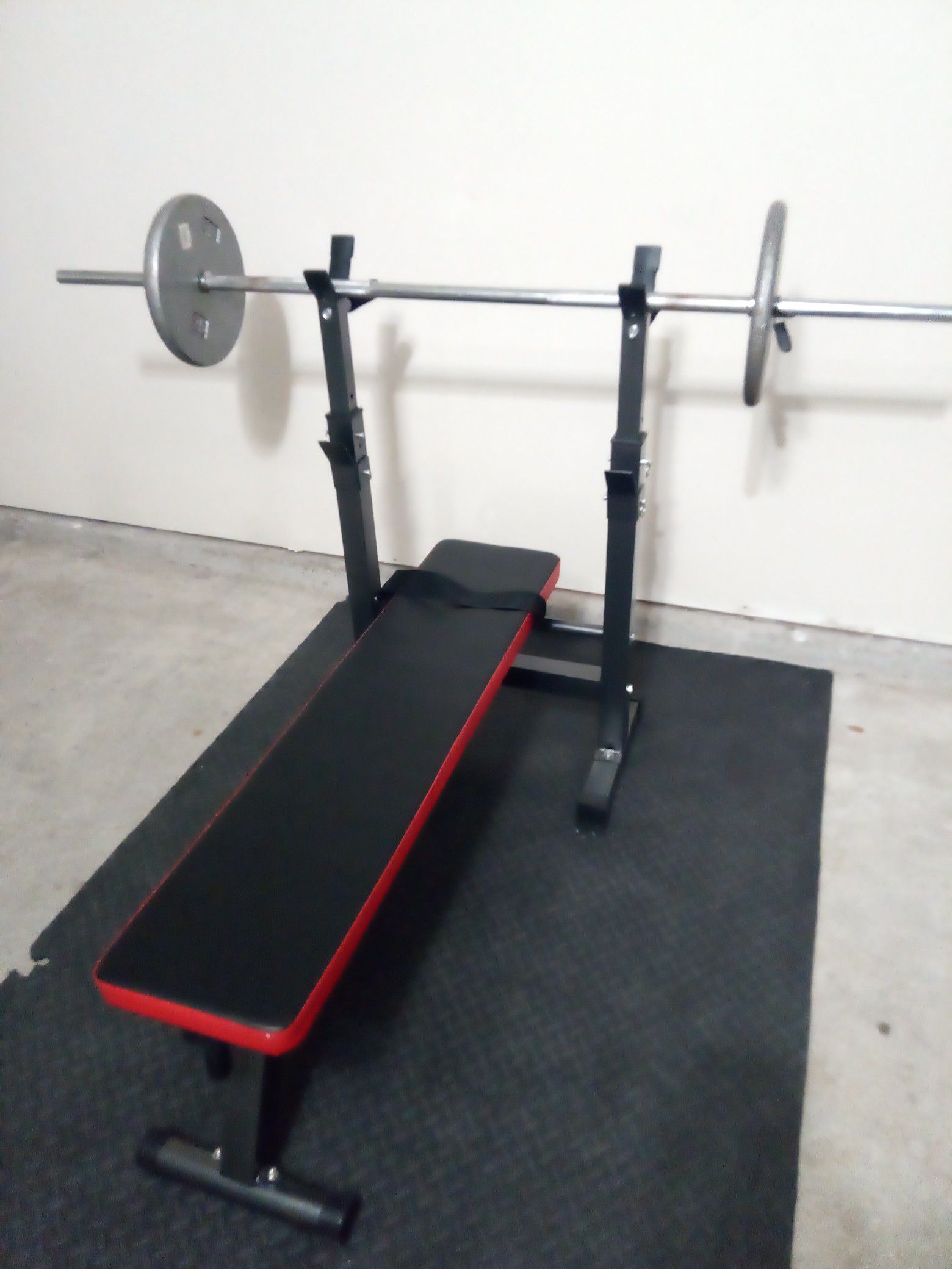 Weight bench, barbell + 50lbs. (exercise set)