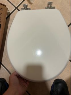 Round enameled white wood toilet seat