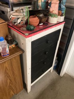 chest of drawers with glass top