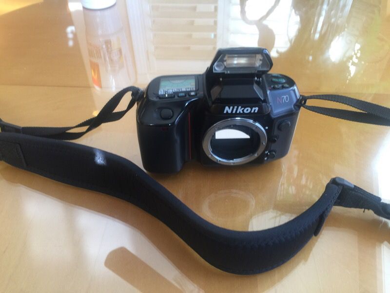 Nikon N 70 camera body with strap.
