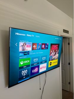 58 inch Hisense 4k tv with TV mount