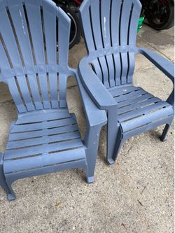 2 Plastic Adirondack Chairs