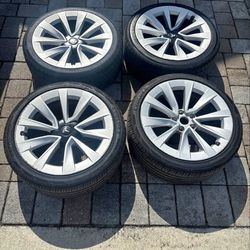 Tesla.\nTires and rims like new