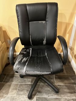 Office chair-leather, wheels ,adjustable