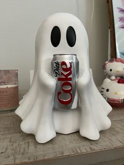 Ghost holding Diet Coke and coke can