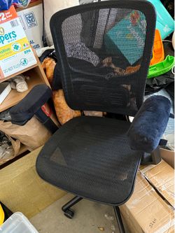 Swivel reclining desk chair with arm rest