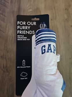 10) Bottle Cruncher Sock Dog Toy