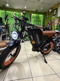 MOVCAN V40 Electric Bike 1500W Motor 35MPH Top Speed 120 Miles Range 7 Speed Dual Hydraulic Brake Electric Bike . It has 300 miles