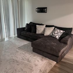  GREY ROOMS TO GO COUCH For Sell BRAND NEW NEVER USED 