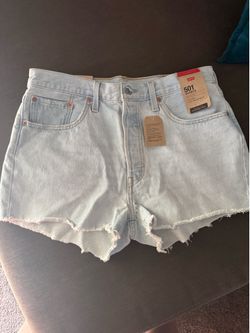 501 womanβs cut off blue shorts