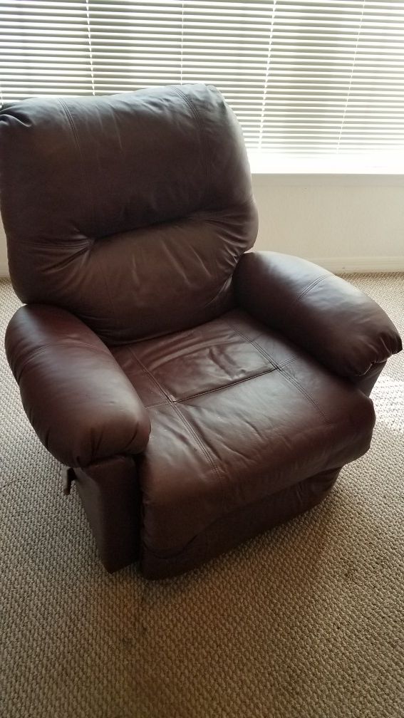 Reclinging leather lounge chair , 360 degree swivel, brown, vgc, $40