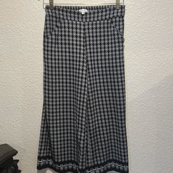 The pants are a pull-on style from the brand Max Studio.