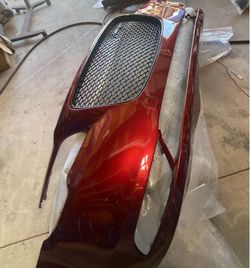 Brand New Velvet Red Chrysler 300S front bumper
