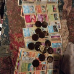 I got sleeves of Pokemon cards and Pokemon coins  whole set 