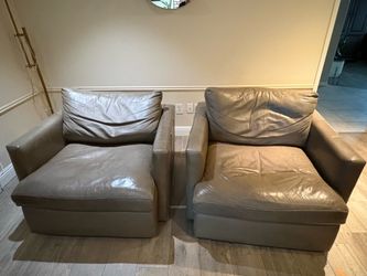 Crate & Barrel large swivel chairs