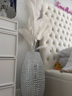 Beautiful Z gallery vase with feathers