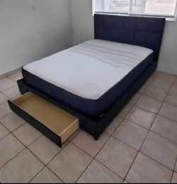 New black full-size bed with drawer