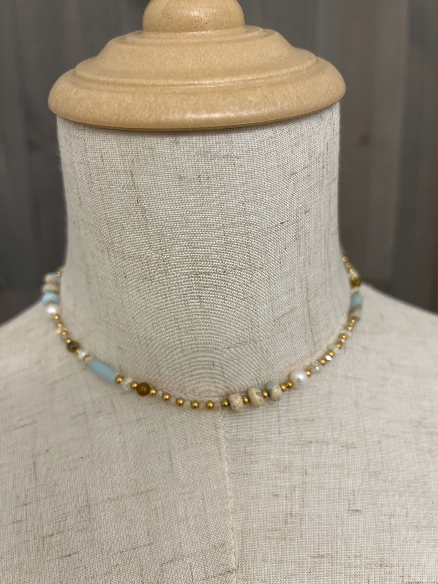 Natural stone with pearl necklace