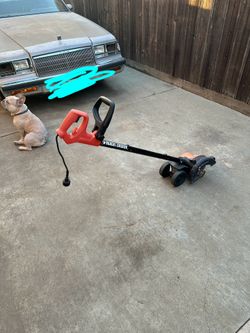 Orange And Black Grass Cutter