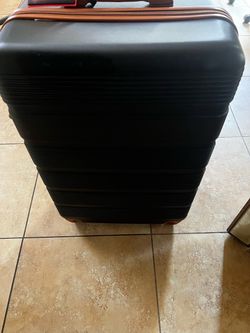 2 piece black hard -shell luggage