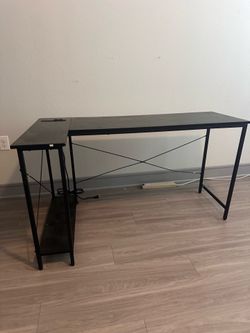 Office desk with plugin for USB and AC Outlet