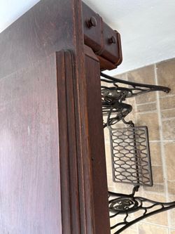 Antique singer, sewing machine with the manual foot pedal