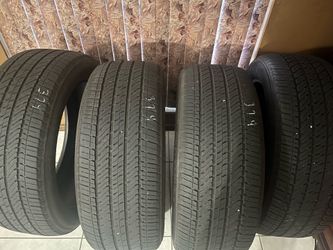 275/50/22. Four used tires Bridgestone good tread.