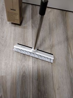 Floor brush new with box, 51 inch adjustable handle.
